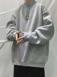 Manfinity Hypemode Losse pasvorm Cartoon gezicht print Opstaande hals Sweatshirts Voor mannen