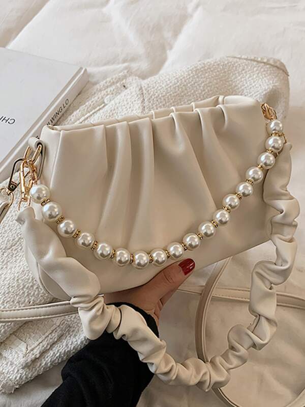 حقيبة روتش ازرار لؤلؤ