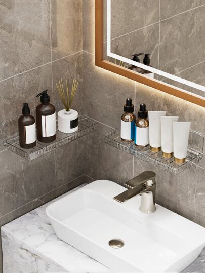 1个透明壁挂式收纳架，简约银色PET材质，适用于浴室及其他浴室配件。