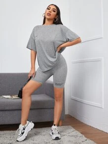 Muchica 落肩上衣和標語圖案機車短褲套裝