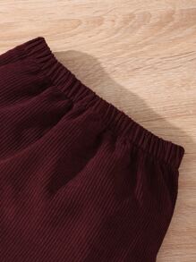 女孩西裝領毛絨內襯燈芯絨夾克和半身裙無毛衣