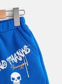 SHEIN 男孩卡通和字母圖案短褲