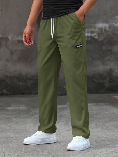 بنطلون رجالي فضفاض بخصر رباط وساق مستقيمة، بنطلون رياضي رجالي أخضر، بنطلون رجالي أخضر زيتوني، بنطلون رجالي كاجوال، بنطلون رجالي ملابس الشارع، بنطلون رجالي أخضر، خريف