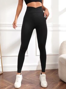 Leggings de yoga sin costuras de cintura súper alta con cintura cruzada y control de barriga - Negro - Ver 4