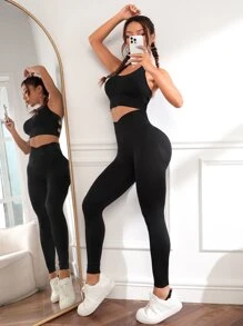 Leggings de yoga sin costuras de cintura súper alta con cintura cruzada y control de barriga - Negro - Ver 5