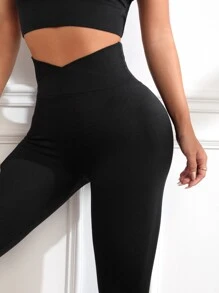 Leggings de yoga sin costuras de cintura súper alta con cintura cruzada y control de barriga - Negro - Ver 3