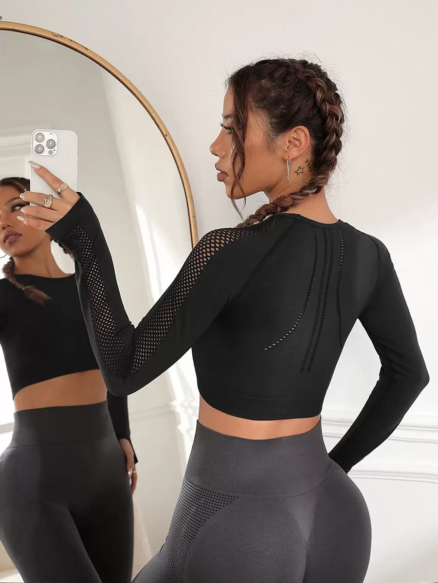 Camiseta deportiva crop con abertura de manga raglán - Negro - Ver 1