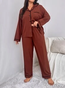 Conjunto de pijama pantalones con blusa ribete en contraste de satén