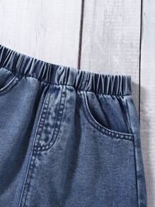 小女童荷葉邊牛仔上衣和半身裙