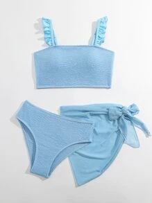 青少年女孩荷叶边褶饰比基尼套装，配有沙滩裙，夏季海滩