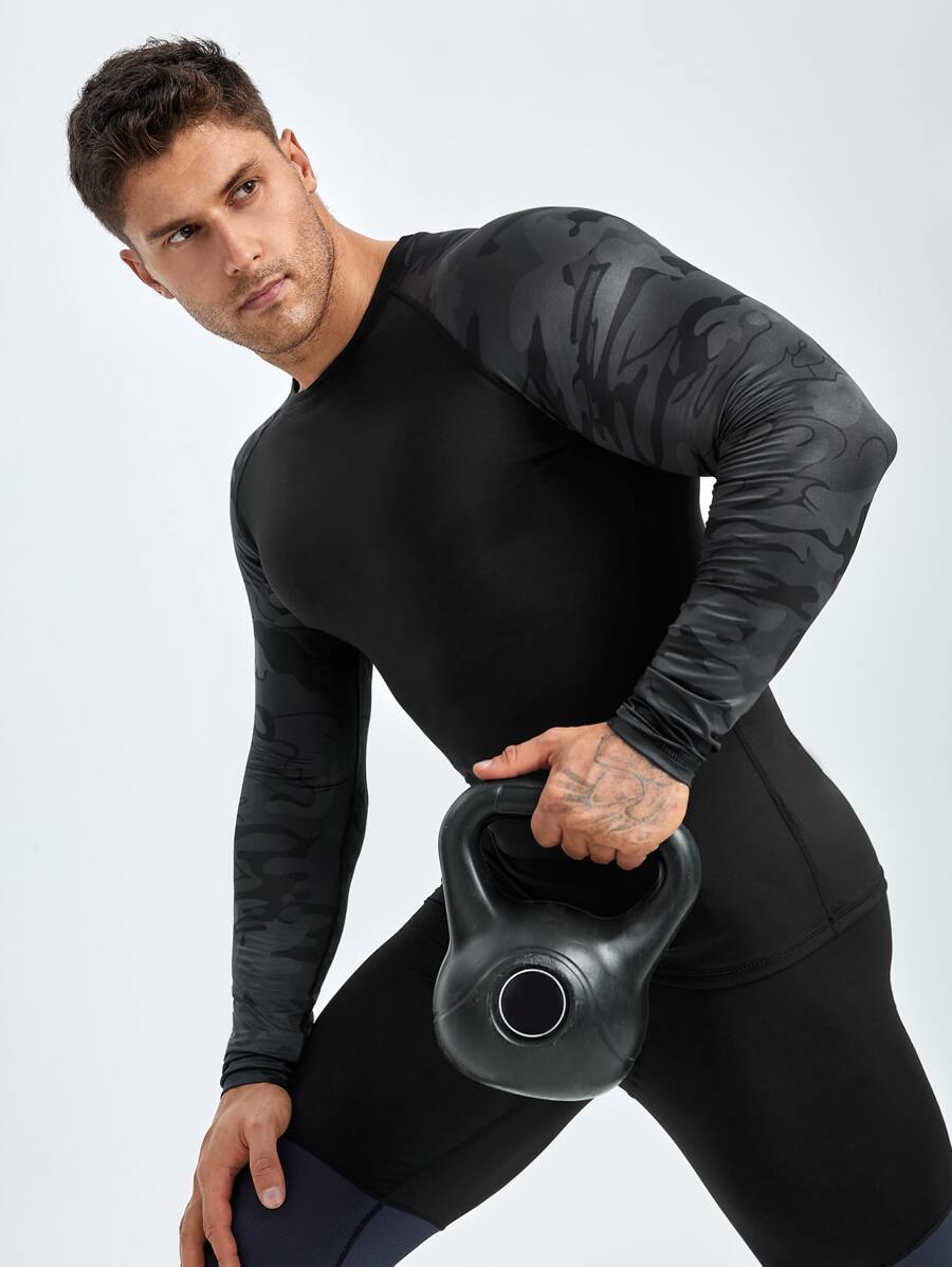 Manfinity Sport Streetwear Hombres Camiseta deportiva de manga raglán con estampado de camuflaje, Tops de entrenamiento, Tops de compresión para hombre - Negro - Ver 1