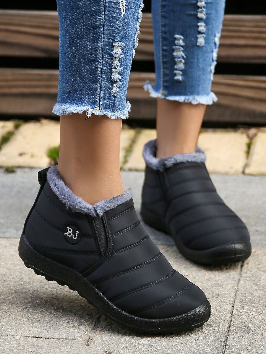 女士時尚運動雪地靴帶襯墊和字母刺繡