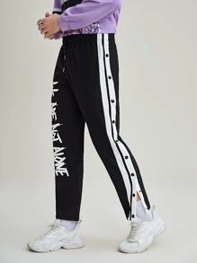 XTRASOLO Men Letter Graphic Contrast Side Seam Button Detail Trousers - Black - View 1