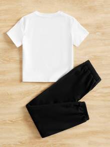 SHEIN Chicas con estampado de figura bajo con nudo Camiseta & desgarro Pantalones deportivos - Blanco y Negro - Ver 2
