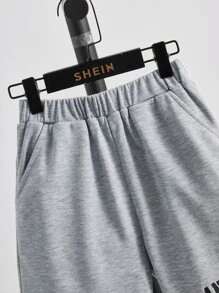 SHEIN 男孩夏季彈性腰抽繩印花運動短褲兩側斜口袋