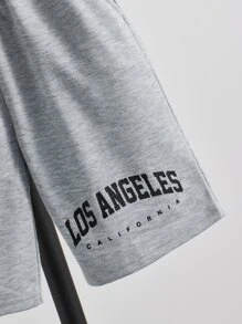 SHEIN 男孩夏季彈性腰抽繩印花運動短褲兩側斜口袋