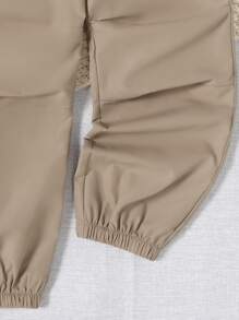 女孩側翻蓋口袋工裝褲