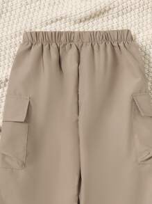 女孩側翻蓋口袋工裝褲