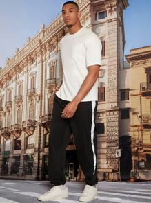 Manfinity Hypemode Hombres Pantalones con costura lateral en contraste - Negro - Ver 4