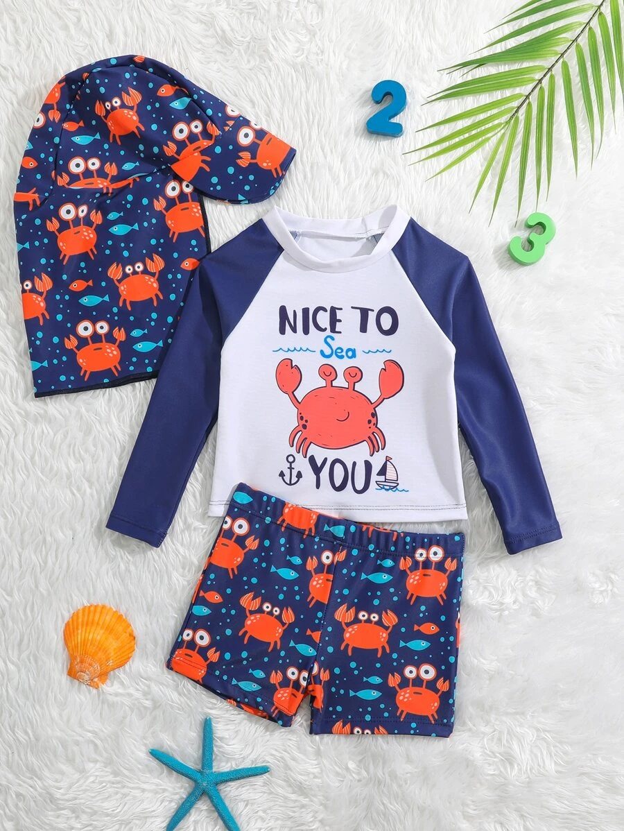 Baby Boy Cartoon Graphic Beach Swimsuit With Swim Cap - Navy Blue - View 1