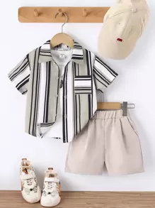 小男童條紋圖案襯衫和短褲和背心上衣