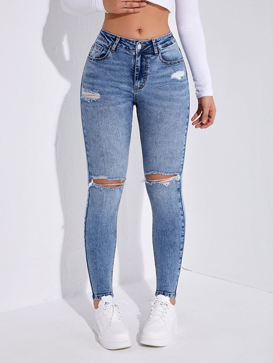 SHEIN Essnce Jeans ajustados desgarro