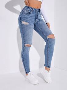 SHEIN Essnce Jeans ajustados desgarro