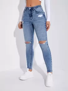 SHEIN Essnce Jeans ajustados desgarro