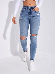 SHEIN Essnce Jeans ajustados desgarro