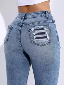SHEIN Essnce Jeans ajustados desgarro