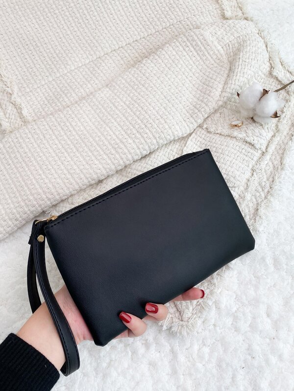 Bolso clutch minimalista con muñequera