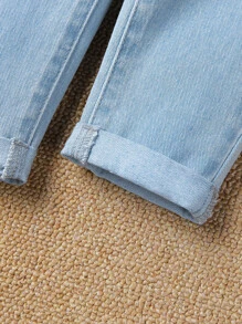 Young Girl Adjustable Waistband Tapered Joint Denim Jeans With Flower Bud Design