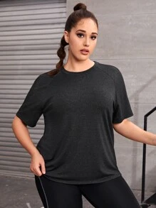 Camiseta deportiva unicolor de manga raglán