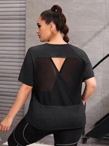 Camiseta deportiva unicolor de manga raglán