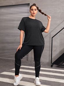 Camiseta deportiva unicolor de manga raglán