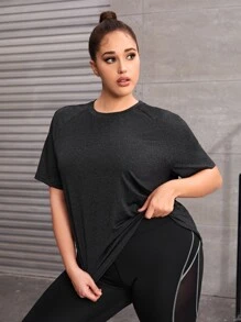 Camiseta deportiva unicolor de manga raglán