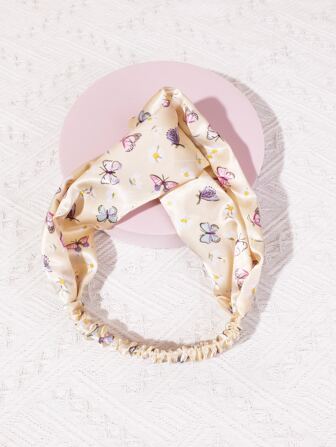 Diadema estilo turbante con detalles de giro, con estampado de mariposa y floral