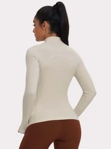 Áo khoác thể thao nữ 1 chiếc, có lỗ xỏ ngón tay cái, dáng ôm, thích hợp cho chạy bộ và tập yoga, phù hợp với thương hiệu VUTRU mùa xuân. - Màu be - Xem 3