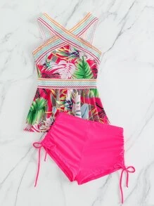 Tankini de verano con estampado tropical y volantes en el bajo