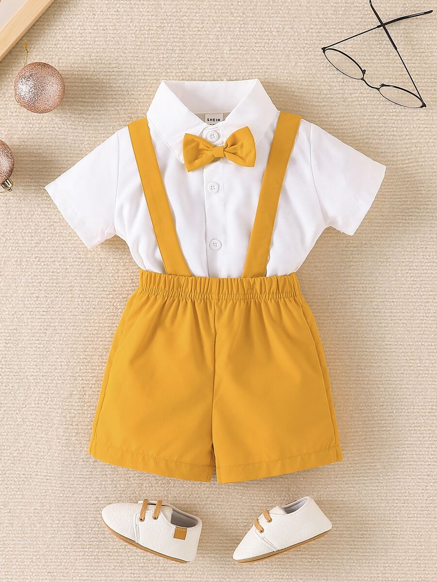 男嬰前蝴蝶結襯衫和背帶短褲