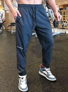 Manfinity Running Men Letter Graphic Drawstring Waist Sports Trousers - Navy Blue - View 1