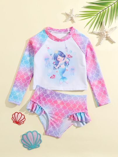 年轻女孩鱼鳞和美人鱼印花荷叶边分体泳衣夏季海滩