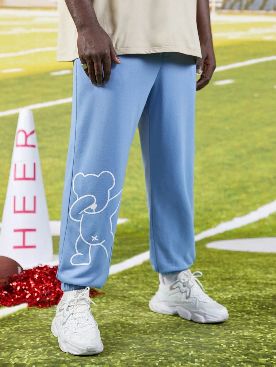 Manfinity Hombres Pantalones deportivos con estampado de oso - Celeste - Ver 1