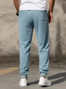 Manfinity Hypemode Quần thể thao Nam Dây kéo Túi Slogan - Màu xanh bụi bặm - Xem 2