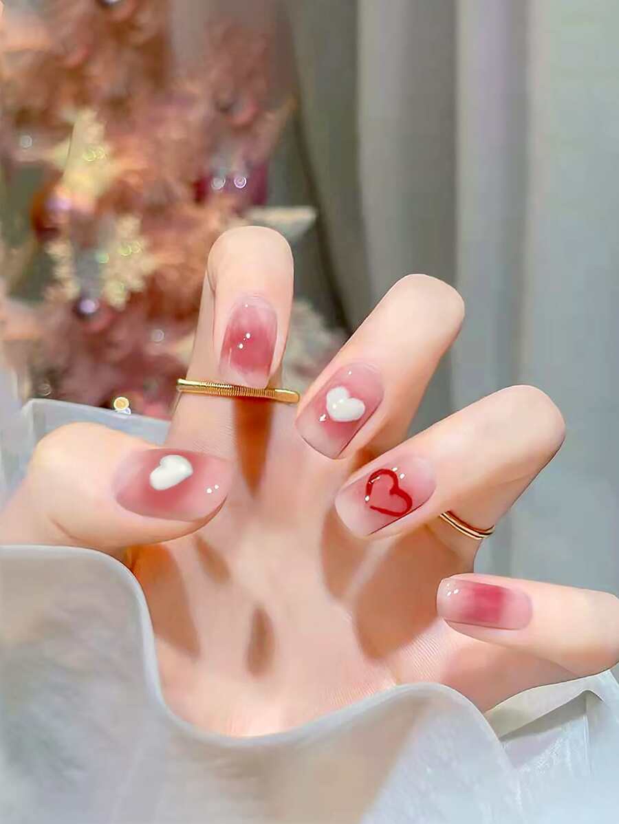 使用24入組短橢圓形、粉色漸變和3D白心設計、假指甲套件立即升級您造型，適合女士和女孩 - 彩色 - 查看 1