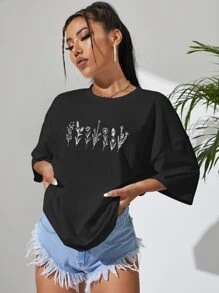 INAWLY Camiseta gráfica holgada con estampado floral y hombros caídos para mujeres