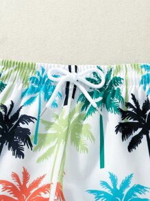 年輕男孩熱帶印花游泳短褲