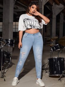 SHEIN Jeans ajustados desgarro con estampado de dibujo - Lavado ligero - Ver 5