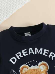 嬰兒熊和字母圖案T恤和裙子