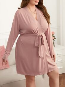 Bata con cinturón unicolor